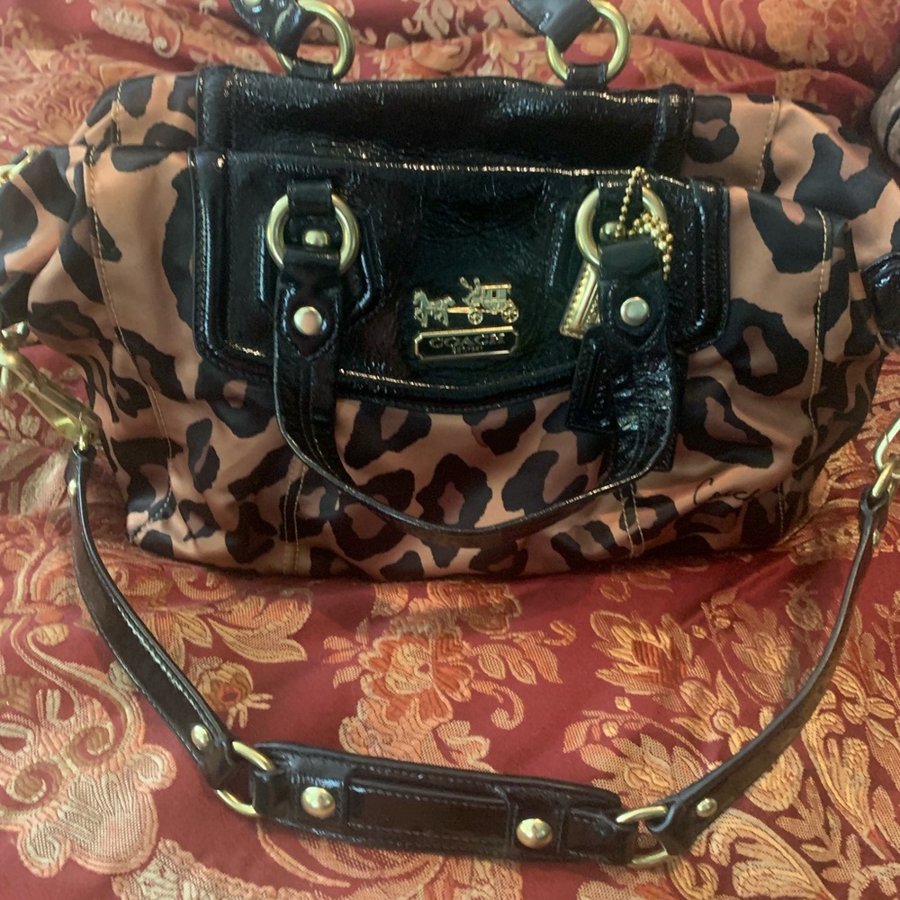 Beautiful Coach leopard bag with gold hardware and patent leather trim